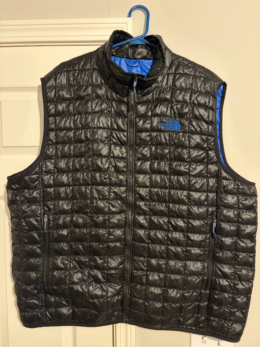 The North Face Black Quilted Vest with Blue Accents